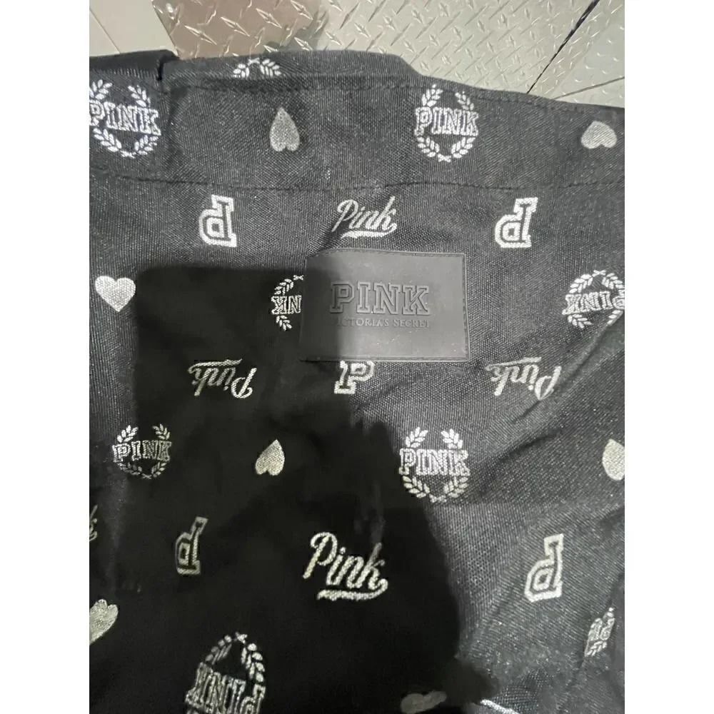 Vintage multi logo black weekender tote bag vs pink